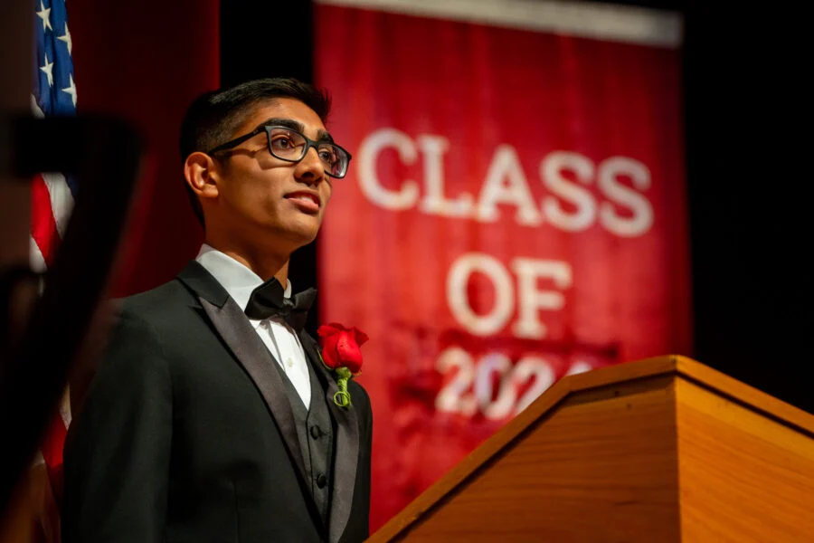 Holland Hall private school student speaking at commencement ceremony after college counseling program