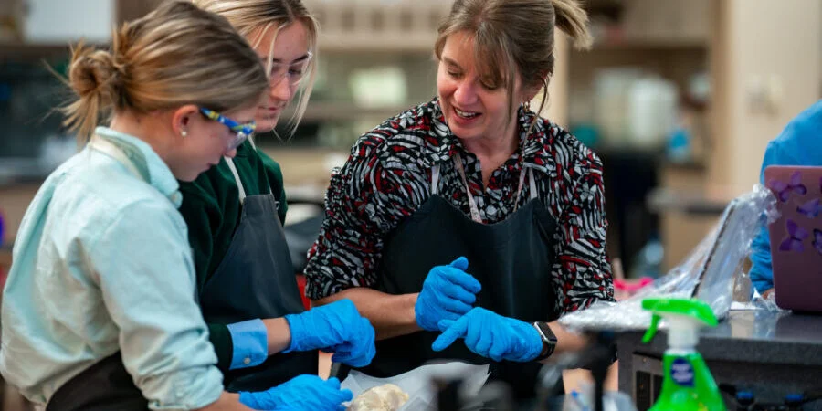Teacher and Students working on the Heart Dissection project in Anatomy.
