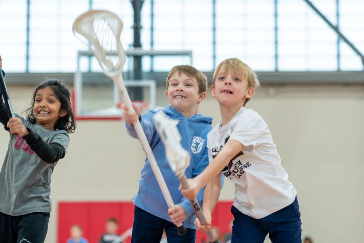 Holland Hall Primary School students participating in daily PE class as part of the athletics program.