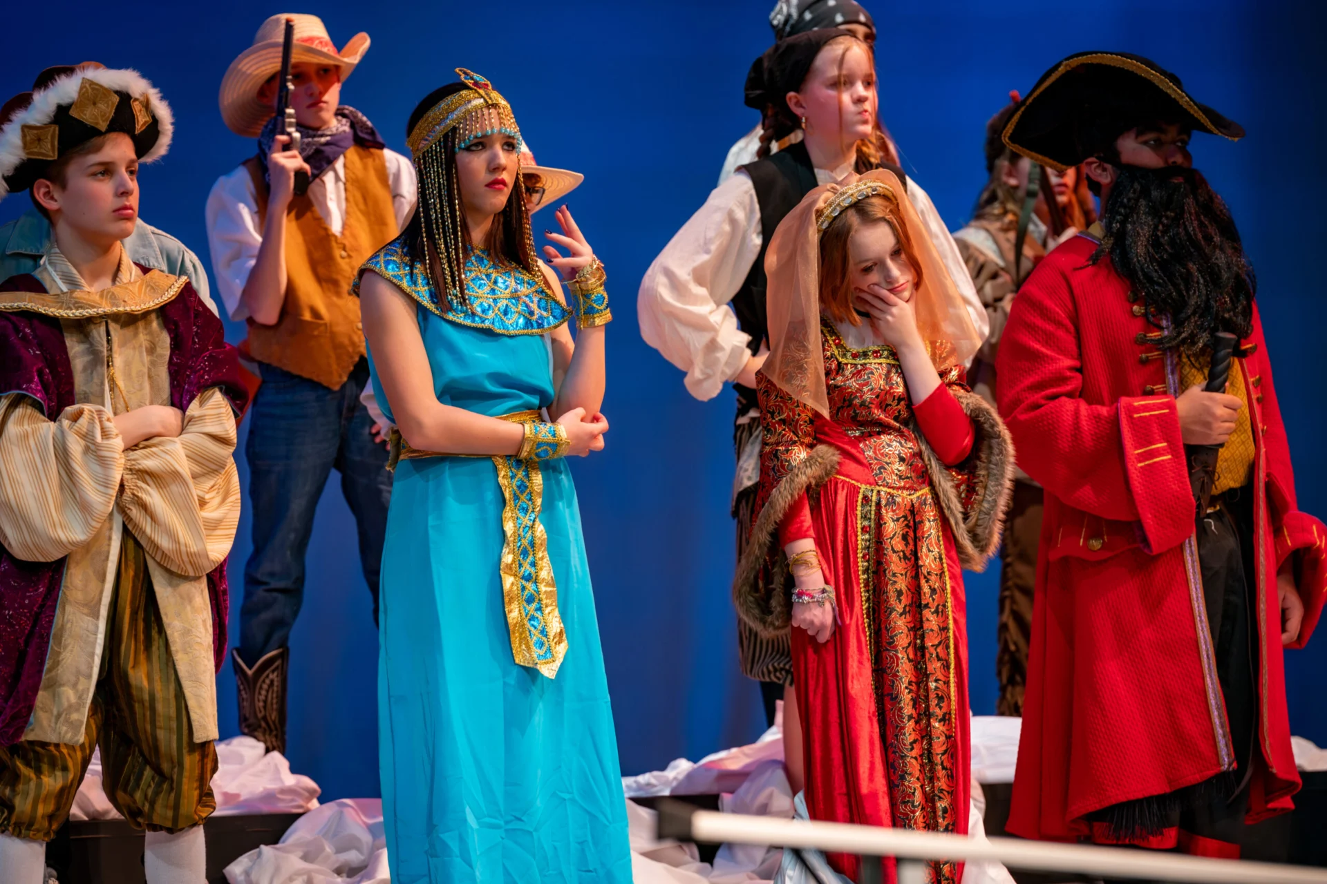 Holland Hall Middle School students in costume during an arts program theater performance.