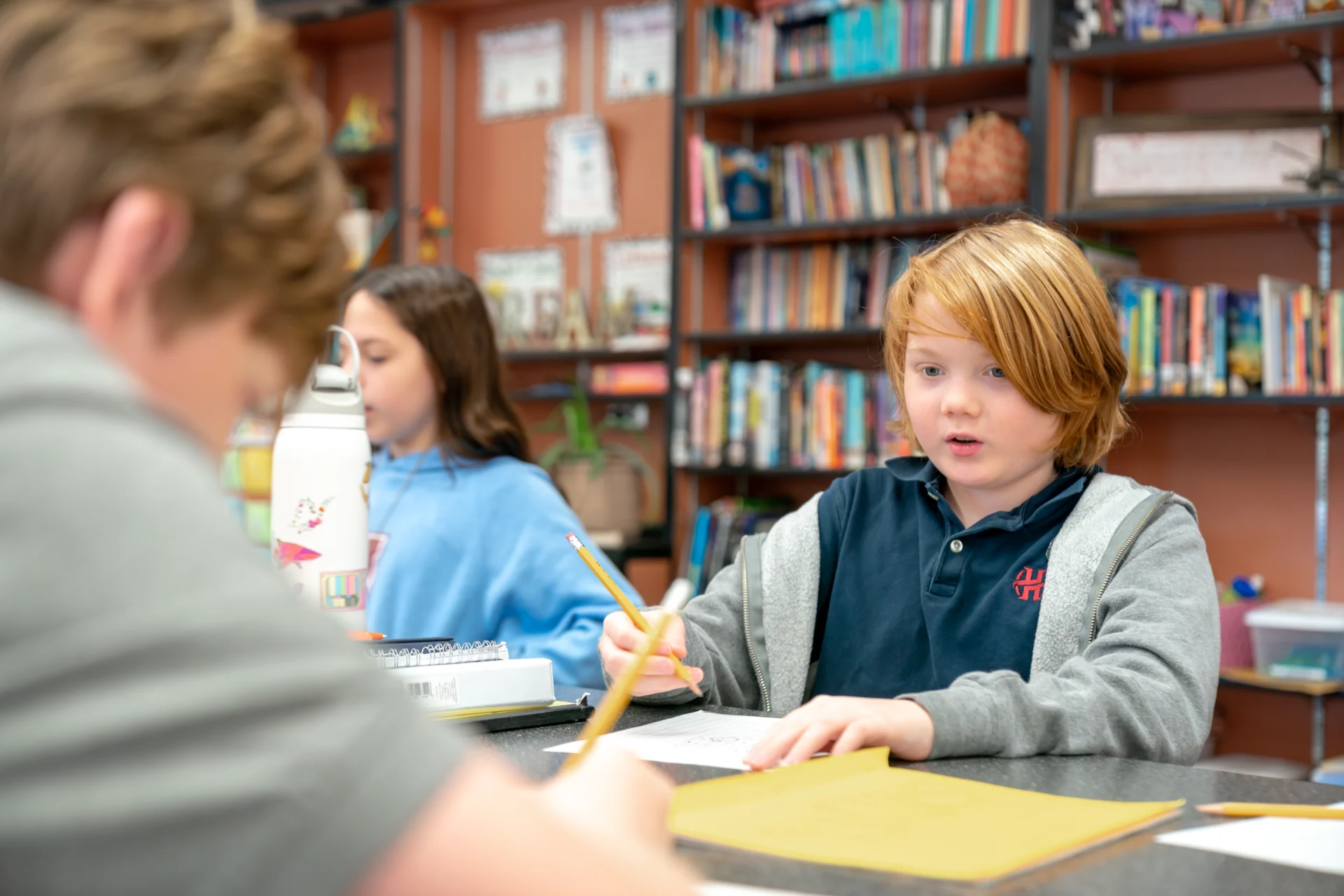 Students studying in the Middle School Library