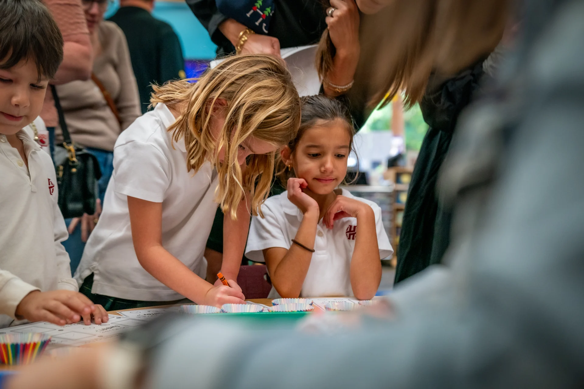 Two primary school students participating in the 5 Senses Fair.