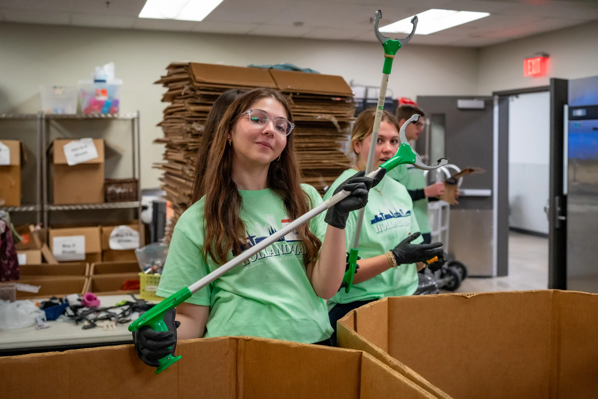 Holland Hall Episcopal School student working at a non-profit during the Day of Service